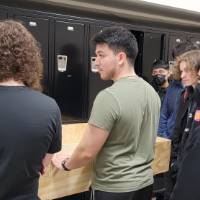 people standing around a project